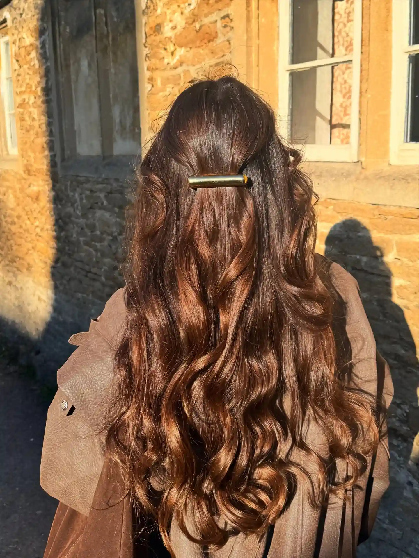 Half Up Barrette Style with Long Glossy Waves