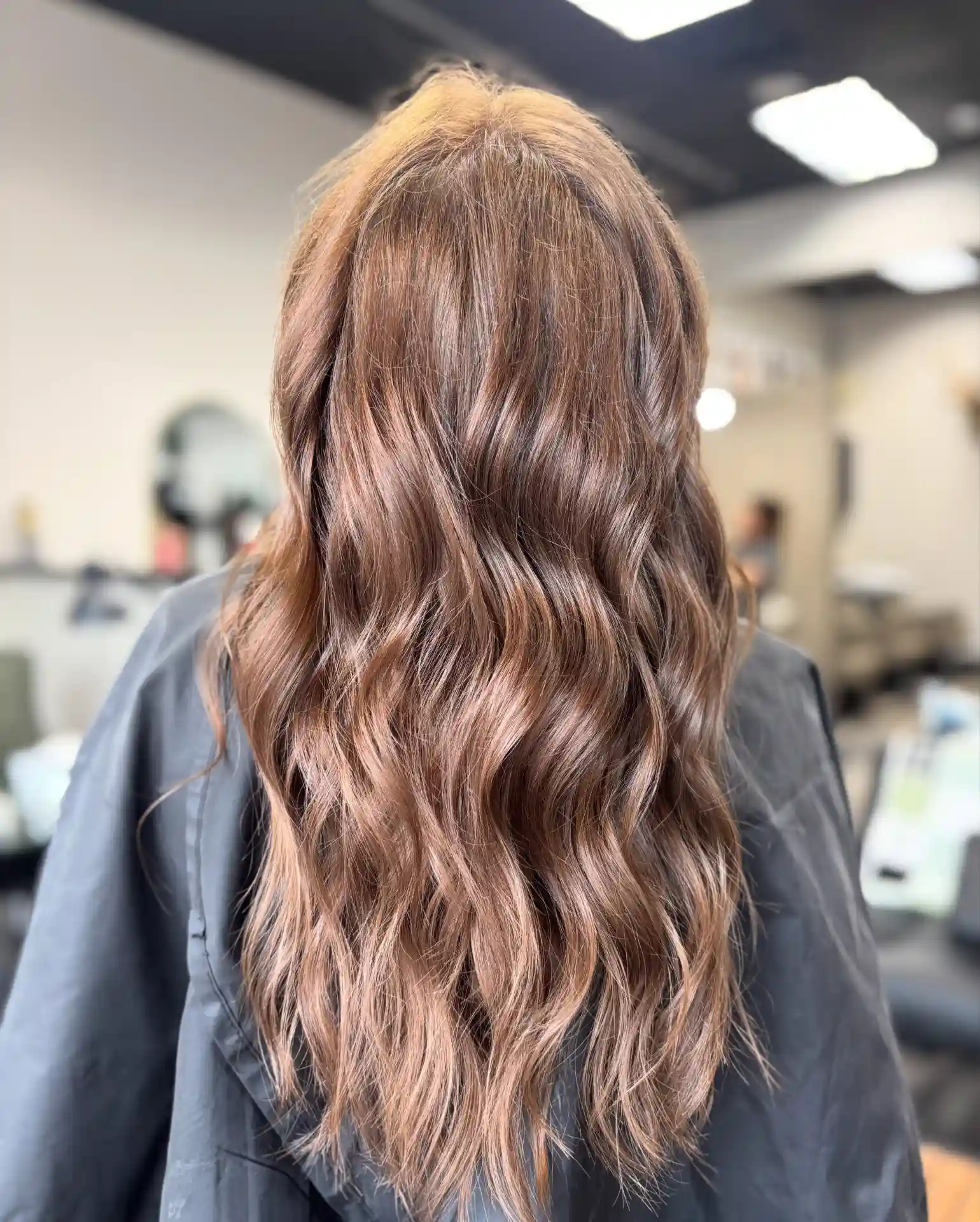 Long Glossy Waves with Soft Dimensional Brunette Color