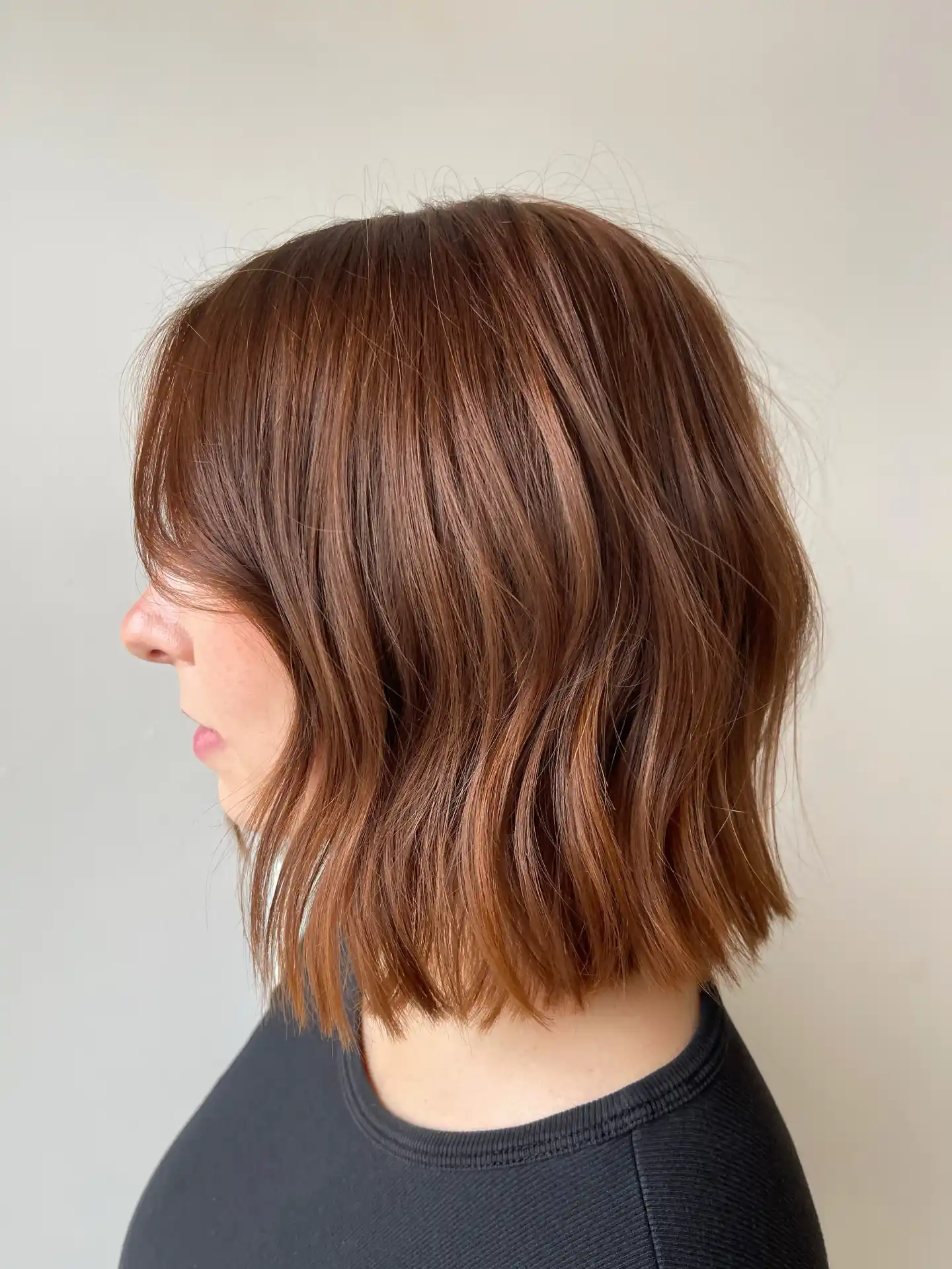 Warm Copper Textured Bob with Soft Curtain Bangs
