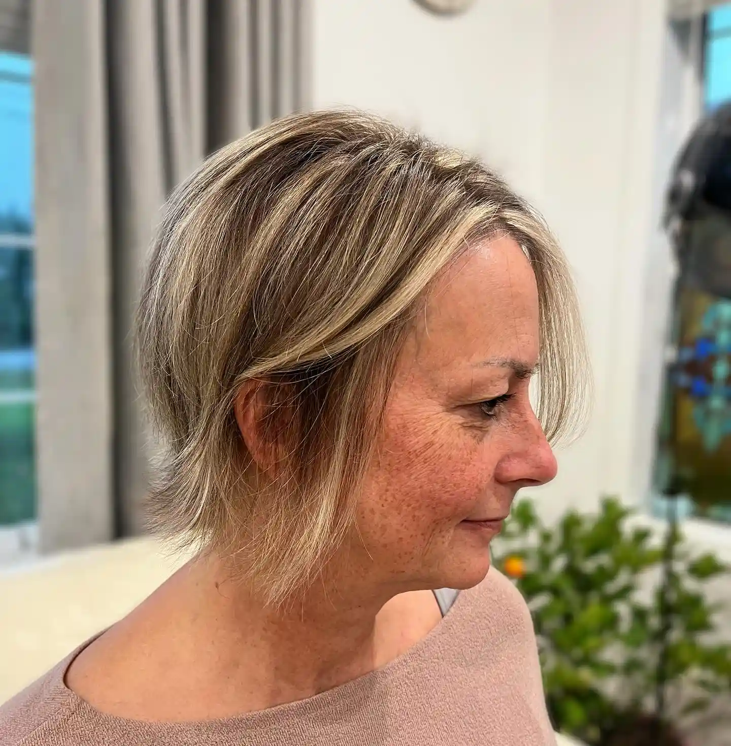 Layered Neck Length Bob with Soft Side Swept Fringe