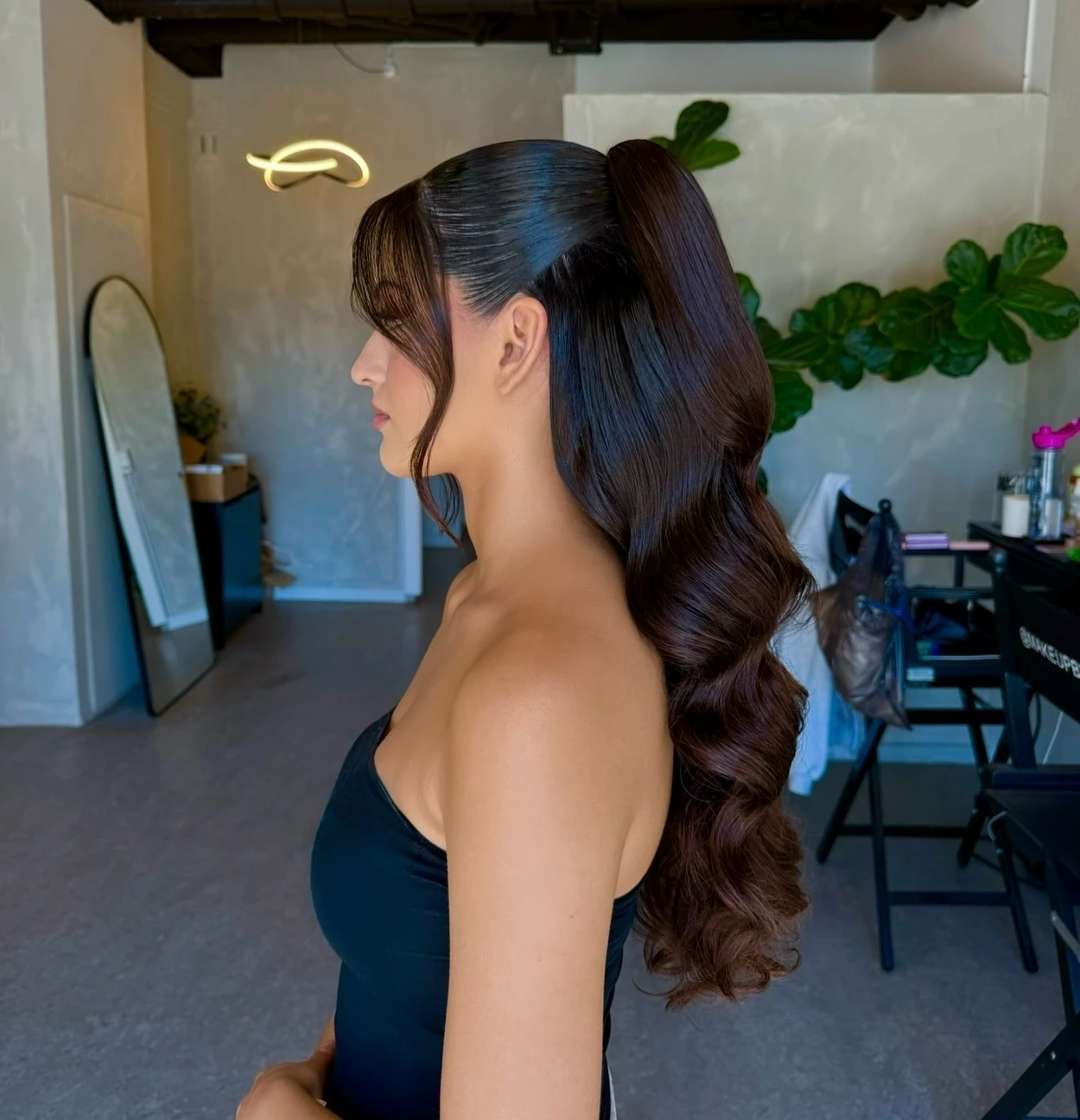 Sleek High Ponytail with Soft Hollywood Waves