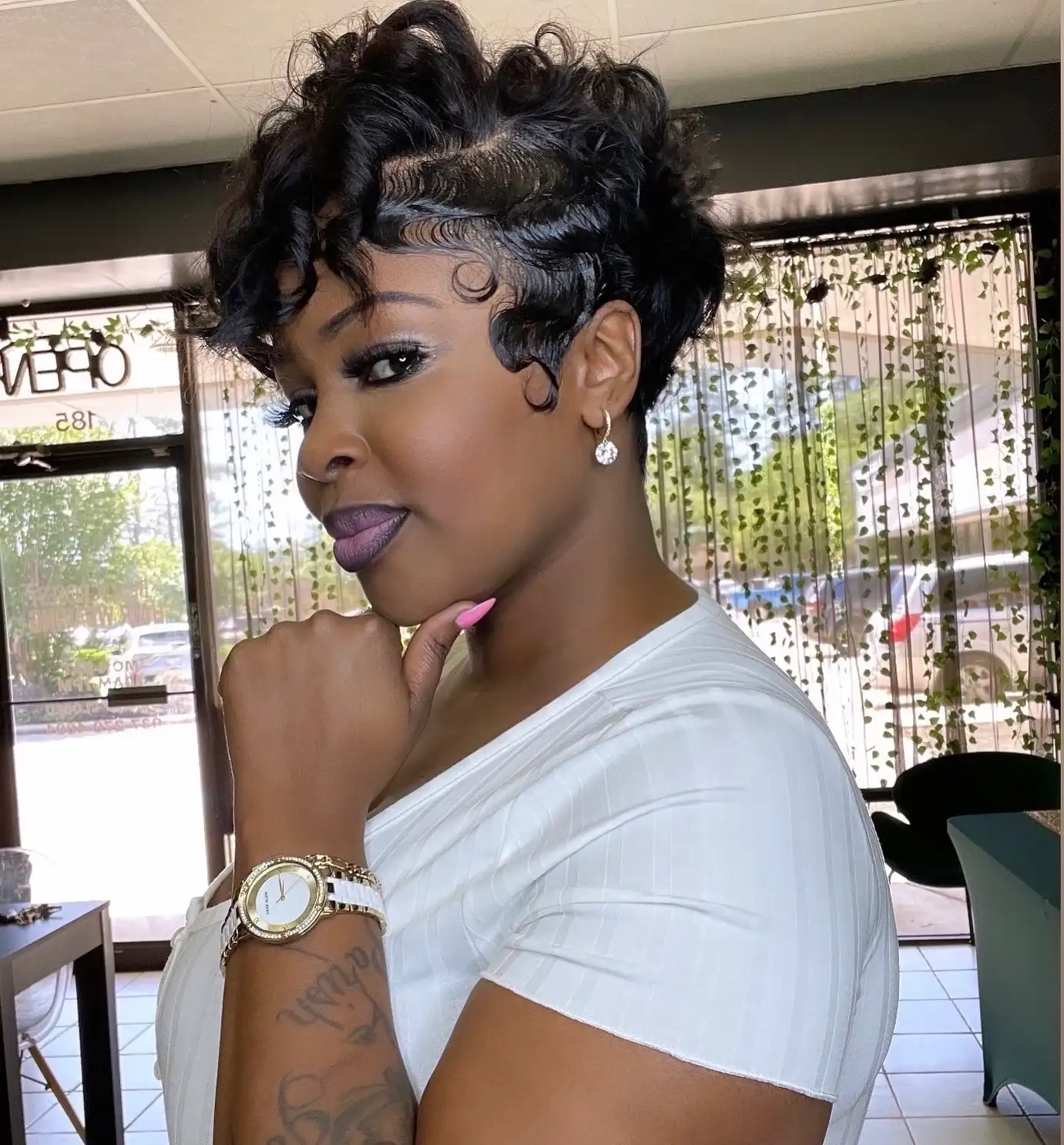 Short Curly Pixie Cut with Sculpted Side Detail