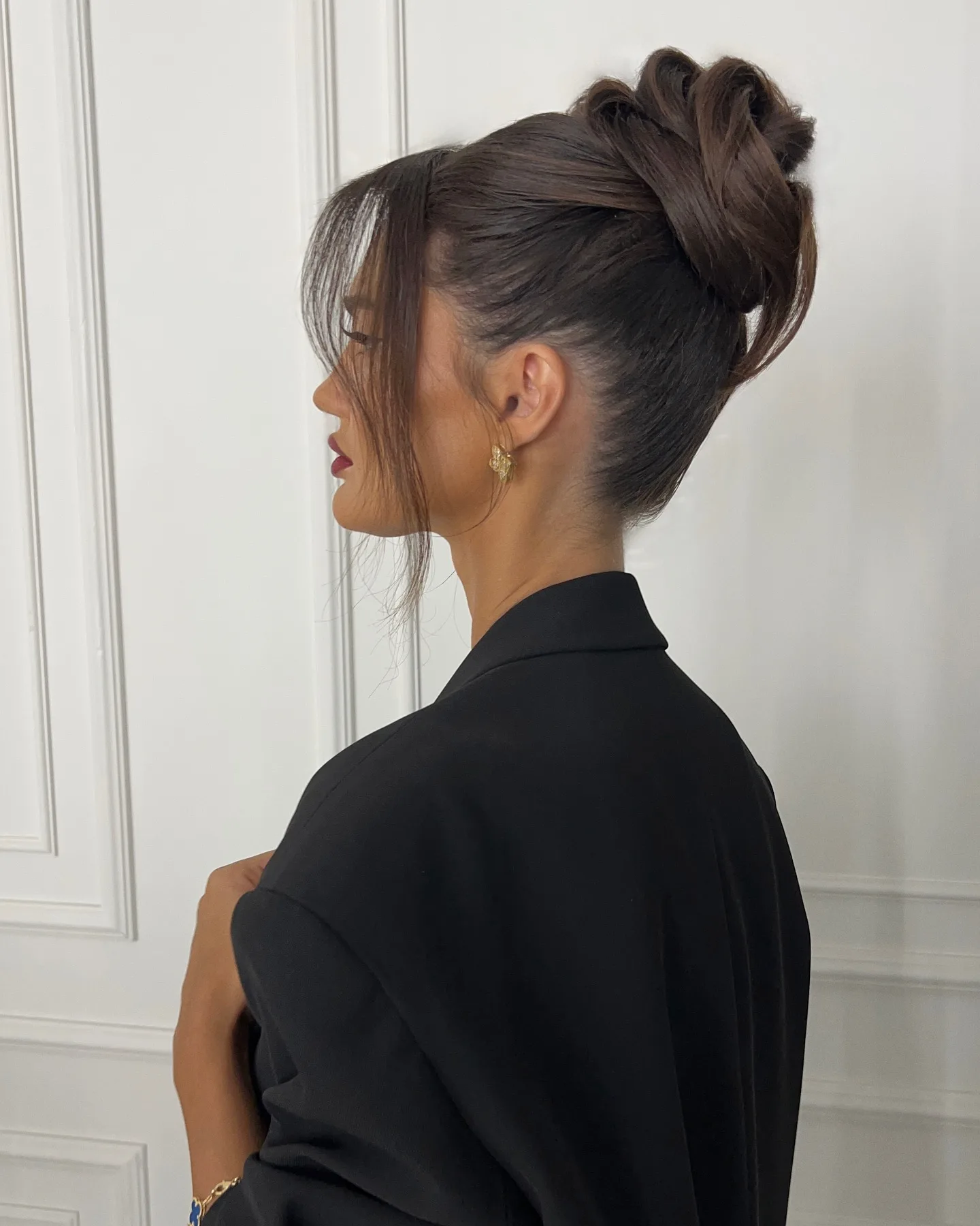 Textured High Bun with Face Framing Curtain Pieces