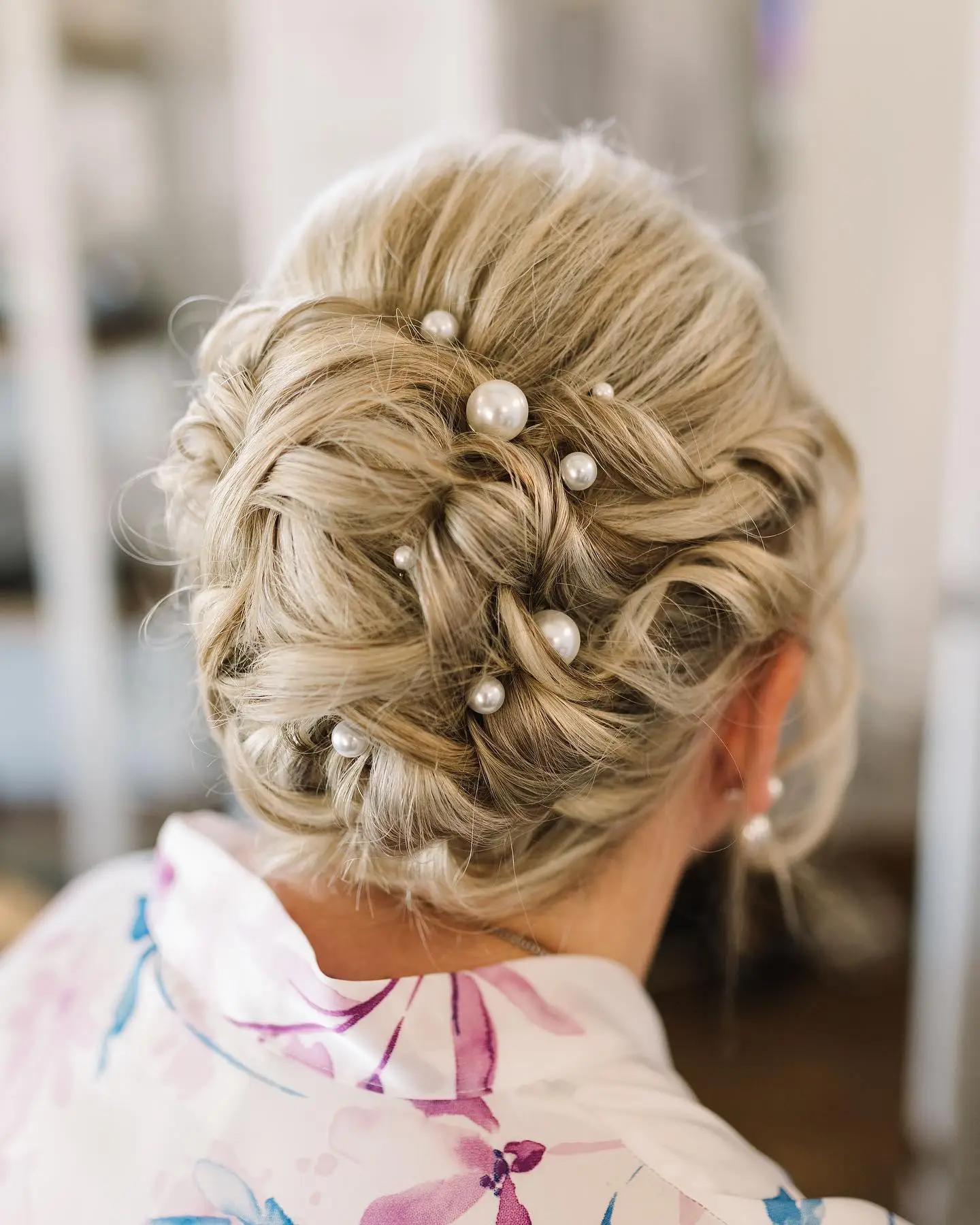Pearl Embellished Low Updo with Soft Twisted Sections